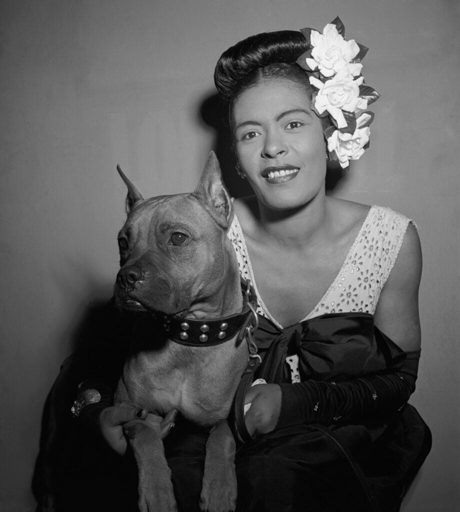 Portrait_of_Billie_Holiday_and_Mister,_Downbeat,_New_York,_N.Y.,_ca._Feb._1947_RVA MAgazine 2026
